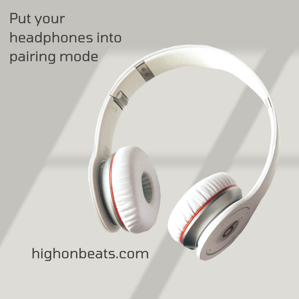 Put your headphones into pairing mode.